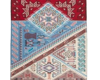 1078
Larry Yazzie (1955-1995, Diné)
A Navajo Blue Canyon raised outline textile, late 20th century
Woven in blue, grey, cream, red and multicolored wools in a combination of various figural motifs including corn stalks, feathers, and birds, with further geometric motifs and banding overall and diagonal banding to the center
87" H x 47.5" W
Estimate: $800 - $1,200