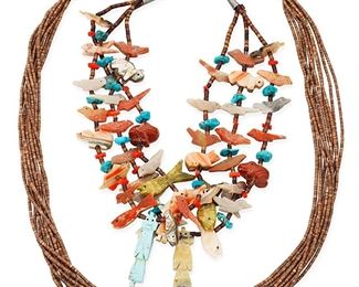 1089
Mid/late 20th century
Two Pueblo Stone And Shell Necklaces
Comprising a triple-strand turquoise and carved stone fetish choker necklace with animals and katsina figures (17.5" L), together with a multistrand brown heishi shell necklace (28" L), 2 pieces
Estimate: $300 - $500