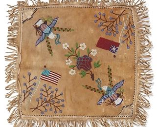 1118
Late 19th/early 20th century
A Plains Beaded Hide Cushion Cover
A square beaded hide cushion cover with a central floral motif, with floral and flag motifs of British America, or the Queen Anne flag, and the United States of America as well as eagle motifs, with a hide fringe and a printed striped calico hand-stitched backing
19" H x 17.75" W; fringe: 2.25" L
Estimate: $300 - $500