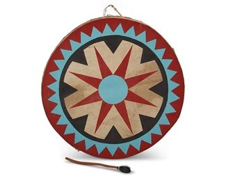 1120
Mid/late 20th century
A Southwest-Style Painted Hide Drum
A large two-sided hide drum with wood splint frame, with polychrome painted star motif and border, with a leather-wrapped carved wood drum beater, 2 pieces
4" H x 26.25" Dia.; beater: 13.5" L
Estimate: $400 - $600