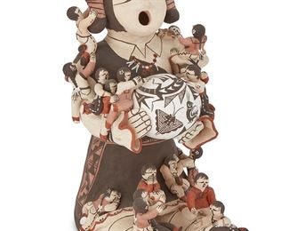1128
Marilyn Henderson Ray (B. 1954, Acoma Pueblo)
Storyteller figure
Signed: M. Henderson / Acoma, N.M.
The polychromed ceramic figure depicted holding a seed pot decorated with animals and insects, surrounded by children and a cat
9.875" H x 5.5" W x 6.75" D
Estimate: $500 - $700