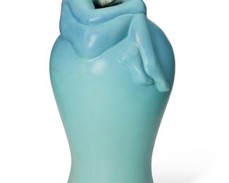 1135
Circa 2001; Colorado Springs, CO
A Van Briggle "Despondency" Pottery Vase
Marked for Van Briggle with impressed double AA mark; further marked: II / V 2 / SAR [Sylvia Rice]
Designed 1902, the baluster-form vase in gradient blue matte glaze with haute-relief recumbent figure around the rim
16.5" H x 8" Dia.
Estimate: $400 - $600