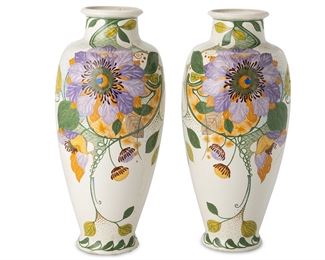 1139
Circa 1910-1920; Holland
A Pair Of Gouda Floral Earthenware Vases
Each marked for Gouda; each further marked: N.P. / [little house] / 588 / SS / Holland
Likely designed by Wilhelmus Petrus Hartgring, two vases each with a hand painted abstracted passionflower vine motif on a white ground, 2 pieces
Each: 16" H x 6.25" Dia.
Estimate: $600 - $800