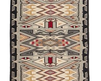 1144
Mid/late 20th century; Diné
A Navajo Teec Nos Pos Textile
Woven in black, light and dark grey, red, cream, tan and green wool with a central waterbug motif and elaborate waterbugs on either side, with multiple all-over geometric motifs, feathers, and a complex border
58" H x 39.5" W
Estimate: $600 - $800