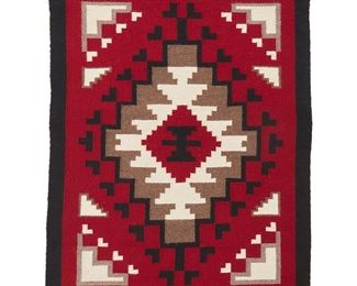 1145
Louise Begay (B. 20th Century, Diné)
A Navajo Ganado textile, mid/late 20th century
Woven in red, cream, grey, and black wool with a central stepped diamond on a red field and black border
36" H x 27" W
Estimate: $300 - $500