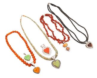 1150
Late 20th/21st century
A Group Of Southwest-Style Jewelry
Variously marked for sterling silver, maker and Mexico
Six works comprising four stone bead necklaces in various colors and sizes, each with a heart-shaped silver stone set pendant, including turquoise, heishi shell, amber, and spiny oyster (largest: 26" L x 2.5" H; smallest: 17" L x 2.25"H), as well as two further sterling silver stone-set heart pendants, one with a carved green stone heart (1.75" H), and one with set spiny oyster and stamped edging (2.5" H), 6 pieces
Estimate: $400 - $600
