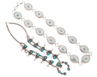 1155
Late 20th century
A Group Of Southwest Jewelry
Two works:
A small sterling silver concho belt with central set turquoise and stampwork accents
Each concho marked: Sterling
35.5" to 38" L x 1.5" H
A squash blossom necklace with silver beads and set turquoise and coral to each blossom and to the central naja
Appears unmarked
28" L x 2.5" H
2 pieces
360.6 grams gross
Estimate: $300 - $500