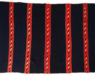 1164
Late 19th century; Diné
A Late Classic Moki Blanket
Woven in bands with a mix of plied and homespun yarn with indigo and black stripes
50" H x 72" W
Estimate: $7,000 - $9,000