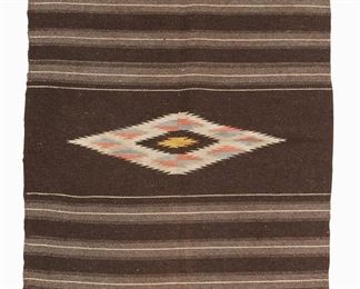 1170
Mid/late 20th century; New Mexico, USA
A Chimayo Textile
Woven in grey, brown, red, blue, and yellow wool with a central Saltillo style diamond motif with black field, and striped banding with motifs to each end, with a central seam
57" H x 28.5" W
Estimate: $200 - $300