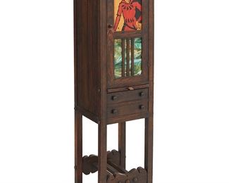1183
Circa 1930s-40s
An Arts & Crafts-Style Humidor Cabinet
The oak humidor with a single-door cabinet decorated with inset green slag glass and a painted and carved wood panel, possibly depicting the Pied Piper, over a pull-out slag glass rolling surface and two short drawers raised on four legs with a carved stretcher
65.75" H x 18.5" W x 18.5" D
Estimate: $600 - $800