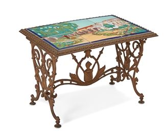 1184
Early/mid-20th century
A Taylor Tilery Tile-Top Mission Scene Table
The tabletop, with six inset glazed terracotta tiles, depicting a garden with a mission in full color, set upon a gilt bronze base with foliate and shield motif
18.5" H x 27" W x 19" D
Estimate: $600 - $800