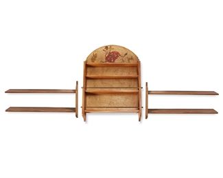 1185
Mid-20th century
A Monterey-Style Wall Shelf
The Monterey/Coronado-style wall unit in light-toned wood with four shelves, two with steel rails, and with faux crackle painted back panel depicting a Mexican vaquero riding a bull in the style of Juan Duran Tinoco (1905-1988), with later-added custom shelf extensions, 3 pieces
Wall unit: 34.5" H x 27.375" W x 5" D; each extension: 16.5" H x 29.625" W x 5.25" D
Estimate: $400 - $600