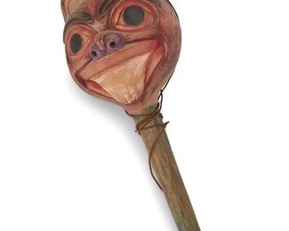 1200
Early/mid-20th century; Pacific Northwest Coast
A Kwakiutl Carved Wood Sun Rattle
A carved wood sun rattle with polychrome painted features and accents, with a twined plant strand wrapped handle
14" H x 10" W x 5" D
Estimate: $700 - $900