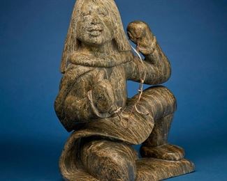 1205
Kiawak Ashoona
1933-2014, Inuit; Cape Dorset/Kinngait
Carved Kneeling Figure With Lanyard, Circa 1989
Stone and hide
Signed syllabically near bottom of figure verso
17.75" H x 12.25" W x 7.625" D
Estimate: $2,000 - $4,000