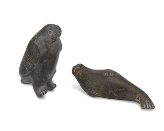 1208
20th century
Two Inuit Carved Stone Figures
The walrus with partially worn label: Canadian Eskimo art
Comprising a recumbent walrus and bird, 2 pieces
Walrus: 2.125" H x 7.25" W x 3.25" D; Bird: 6" H x 2.75" W x 4.25" D
Estimate: $200 - $400