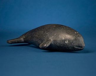 1209
Tuki (Tukai)
1888-1979, Inuit; Port Harrison/Inukjuak
Carved Whale Figure
Stone
Syllabic symbol to underside; further marked with sticker to underside: Canadian eskimo art
3' H x 11" W x 5.5" D
Estimate: $200 - $400