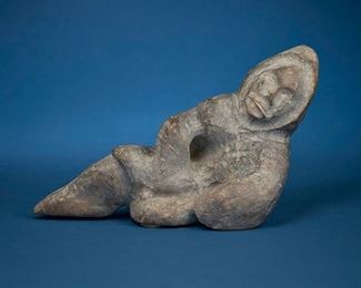 1218
Paul Toolooktook
1947-2003, Inuit; Baker Lake/Qamani'tuaq
Carved Lounging Figure
Stone
Appears unsigned
7.75" H x 12.5" W x 7" D
Estimate: $500 - $700