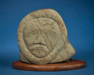1221
Mannumi Shaqu
1917-2000, Inuit; Cape Dorset/Kinngait
Carved Head Figure
Stone on wood plinth
Marked with sticker applied to figure verso: canada eskimo art
With base: 9.25" H x 11.375" W x 5.375" D
Estimate: $300 - $500