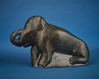 1236
Allie Kasudluak
1926-1982, Inuit; Port Harrison/Inukjuak
Carved Elephant Figure, 1979
Stone
Signed syllabically to underside and dated: © / 1979; further marked: I N-5-115103; with sticker: canada eskimo art esquimau
7.625" H x 12.325" W x 3.875" D
Estimate: $200 - $400