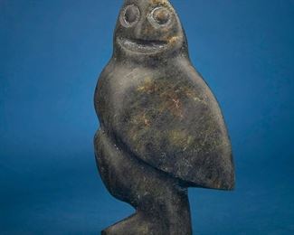 1249
Nipisha Osuitok (Neepeesha)
1925-1980, Inuit; Cape Dorset/Kinngait
Carved Owl Figure
Stone
Signed syllabically to underside; further marked with stickers to underside: Nipicha / CD
8.25" H x 4.75" W x 2.875" D
Estimate: $200 - $300