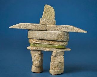 1252
Ralaa Nutarariaq
active late 20th century, Inuit; Nunavut Territory
Carved "Inunnguaq" Stacked Stone Human Figure
Stone and serpentine
Signed syllabically to underside of feet and numbered: 187
6.5" H x 7.625" W x 1.875" D
Estimate: $200 - $400
