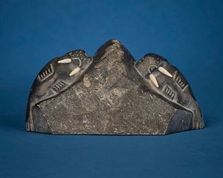 1254
Tumasi Uqaitu Qinuajua (Thomasie Ken)
b. 1948, Inuit; Povungnituk/Puvirnituq
Carved Walrus Figures With Tusks
Stone and bone
Signed to underside: Ken
4.125" H x 8.5" W x 4.375" D
Estimate: $300 - $500