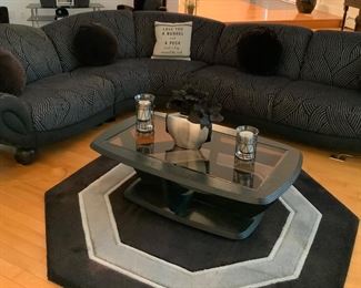 Sectional sofa: 206 “ curved length x 36 “(D) x 36”(H) made by Weiman Furniture. Pristine condition. No wear or tear. Coordinating zippered pillows are included with purchase.