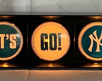 Something for the ULTIMATE fan! Can be hung horizontally or vertically. Lights up one at a time and signally.