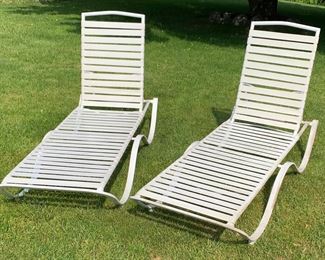 Metal and vinyl adjustable lounge chairs. Purchased in 2022. Used once.