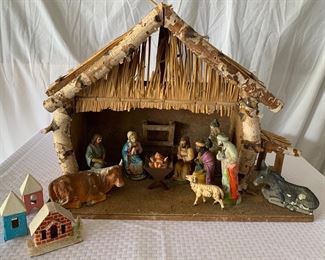 Manger in need of some light renovation work. Holy Family and “friends” complete. Made in pre WWII Germany (see bottom of figures). Figures are plastic and can be repainted with model paints! Small village pieces sold separately.