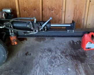 Custom built hydraulic log splitter. 
Saves a lot of time and back pain!
Starting price: $1400.00. 