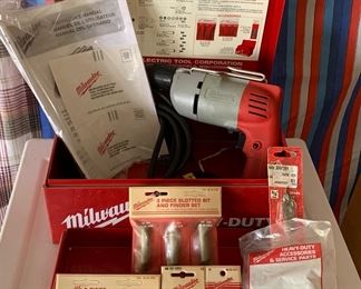 Milwaukee screw shooter kit plus many extras! A great value.