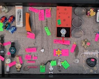 Display case full of smalls! Some jewelry “925,” but also costume jewelry. 