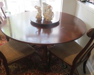 ROUND DINING TABLE WITH 6 CHAIRS.