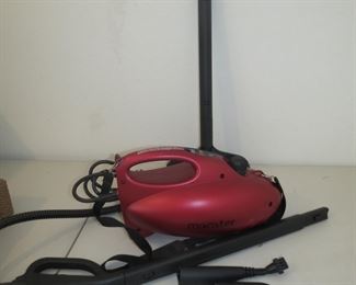 MONSTER STEAM CLEANER WITH ATTACHMENTS.