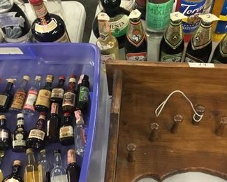 Collection of small, full liquor bottles