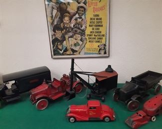 Outstanding collection of 1920's Buddy L trucks, an original 'Little Rascals' poster.  These items are located offsite and available June 1-4.