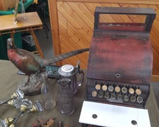 Antique cash register in original condition, glass door knobs, milk bottles.  These items are located offsite and available for sale June 1 -4.