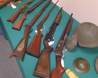 Firearms (not all are pictured - watch for new photos);  helmets including a miniature 1934 helmet.  These firearms and miscellany are located offsite and available for sale June 1-4.