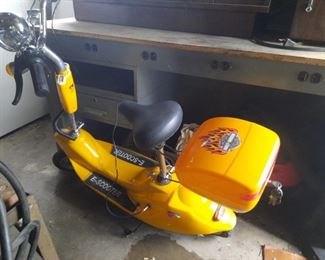 Vintage electric scooter.  This scooter is located at the home and available for sale June 3-4.