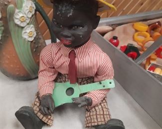 Vintage wind up musical Black Collectible in working condition.  This items is located offsite and available for sale June 1-4.