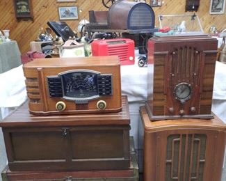 Vintage radios and antique wooden boxes are located offsite and available June 1-4.