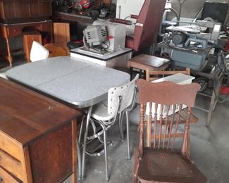 1950's formica and chrome table, power table saw, rocker, other items in the garage at the estate in 80903. These are available June 3-4.