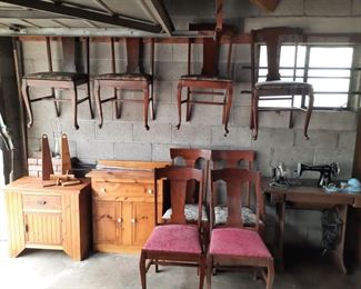 Vintage pine cabinets, set of (6) dining room chairs with Queen Anne legs, Treadle Singer sewing machine. Located at the 1898 home and available June3-4.