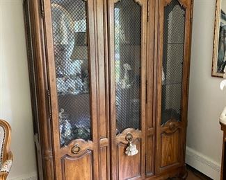 French provincial-style three door cabinet                                   77"h x 65"w x 19.5"d