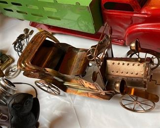 Vintage Animated brass music box car.