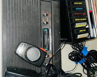 Atari 2600 with 8 games and controllers 