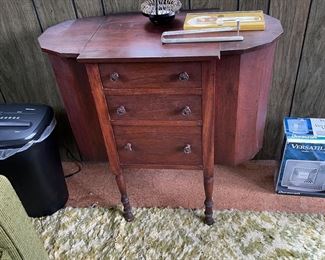 Vintage sewing cabinet.