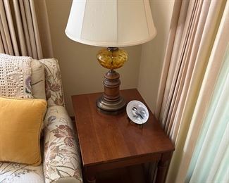 One of two matching Carl Forslund accent/side tables; one of two matching vintage table lamps; Brumm chickadee plate with stand.