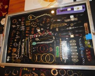 SHOWCASE FULL OF VINTAGE COSTUME JEWELRY